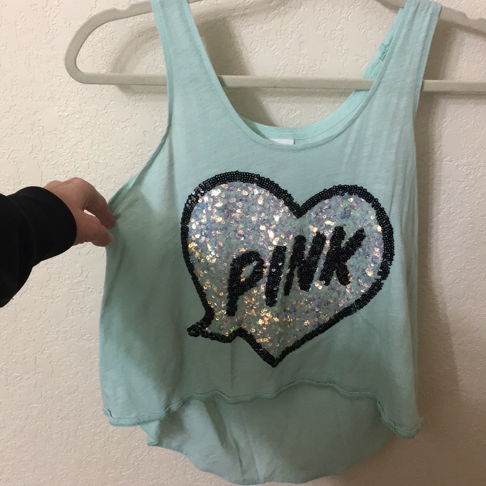 A cute blue and black shirt from pink.